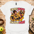 White T-shirt with a colorful child and dog graphic and “I'm Not Heavy I'm Your Baby” text