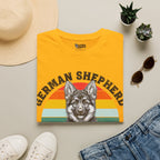 Yellow T-shirt with partial rainbow German Shepherd puppy face graphic on the front