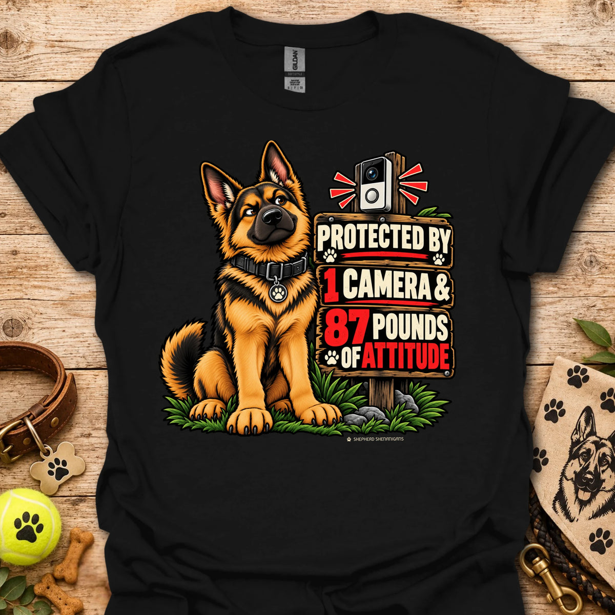 Graphic dog t-shirt in black, front print of a sitting German shepherd dog