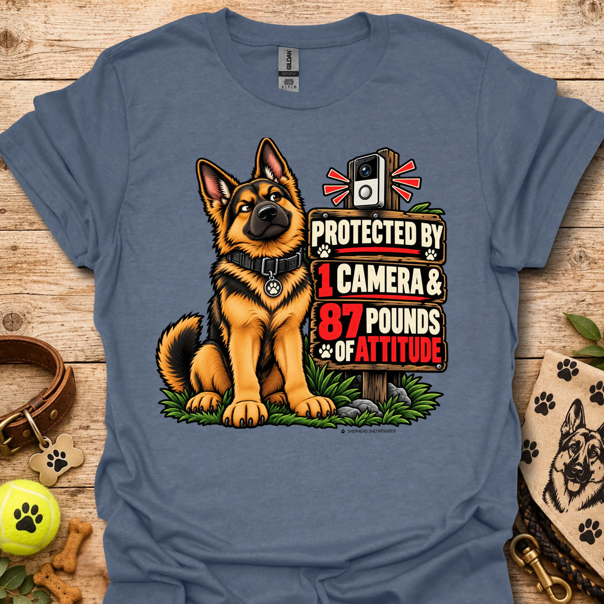 Graphic dog t-shirt in blue, front print of a sitting German shepherd dog