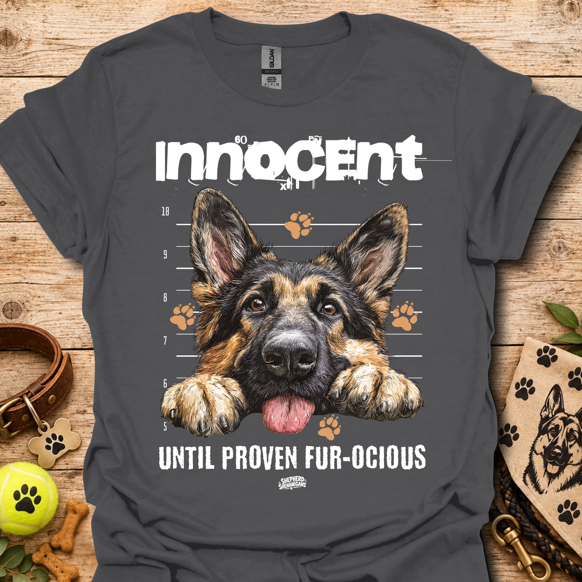 Charcoal T-shirt with German shepherd graphic and "Until Proven Fur-ocious" slogan