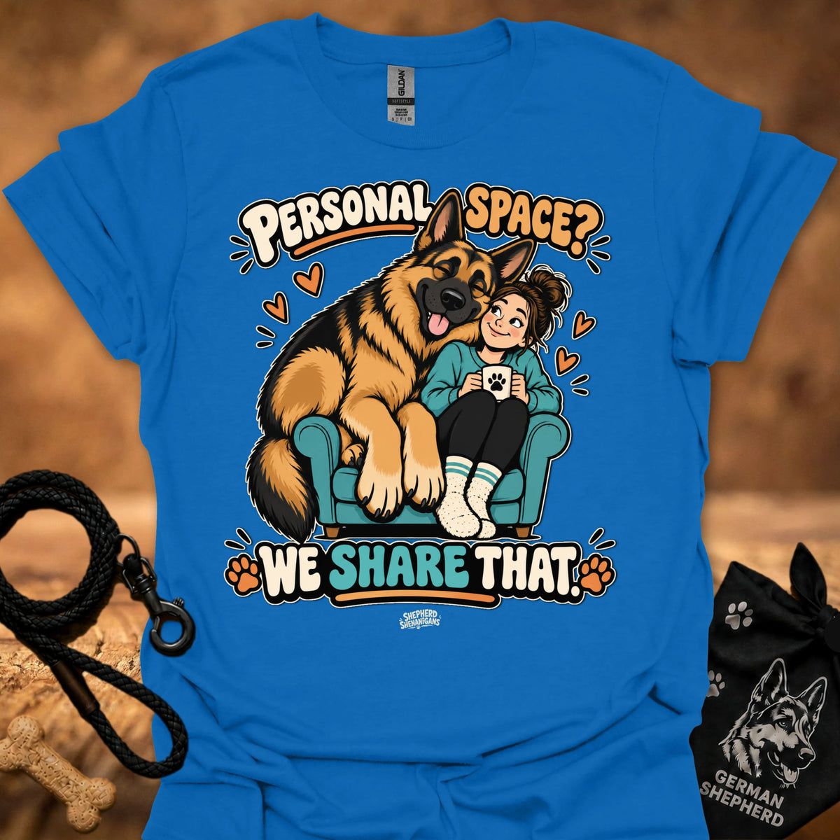 Blue crewneck t-shirt with German shepherd hugging child graphic and 'WE SHARE THAT' text