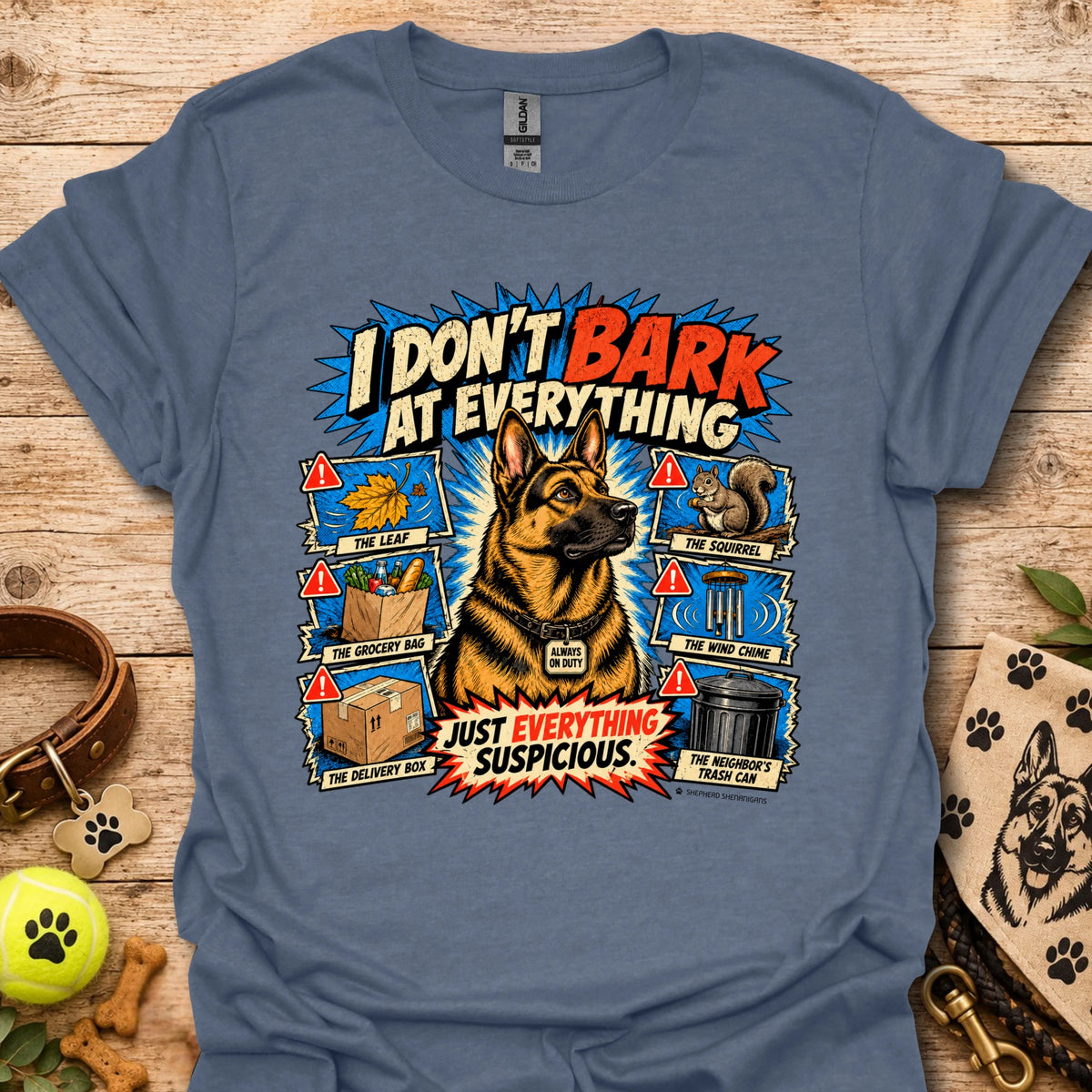 Blue T-shirt with colorful comic dog graphic and bold slogan print