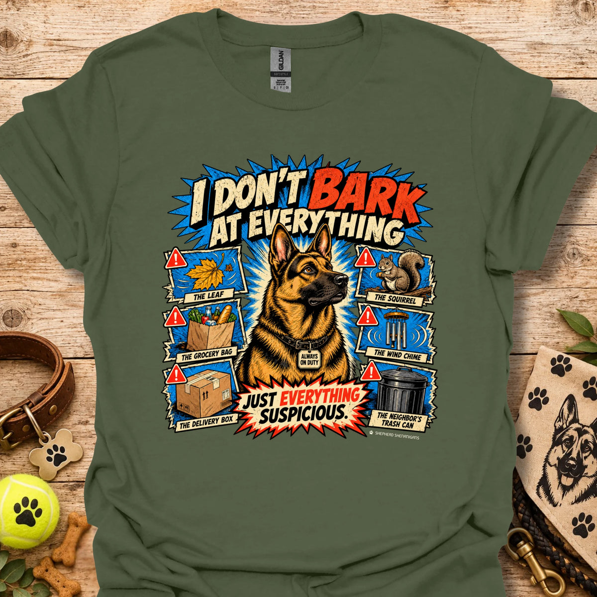 Olive green T-shirt with colorful comic dog graphic and bold slogan print