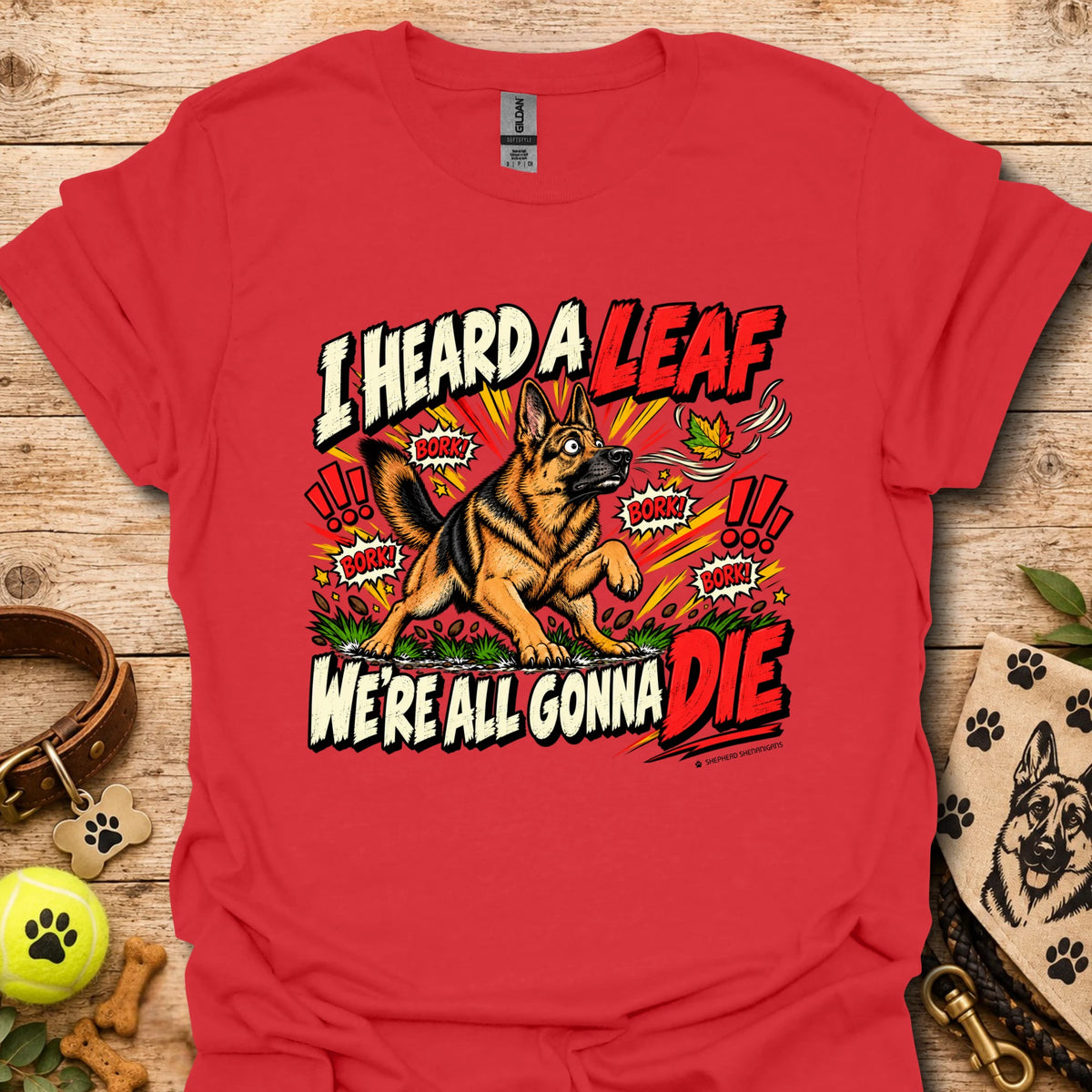 Red crew-neck T-shirt with colorful dog-and-leaf front graphic, short sleeves
