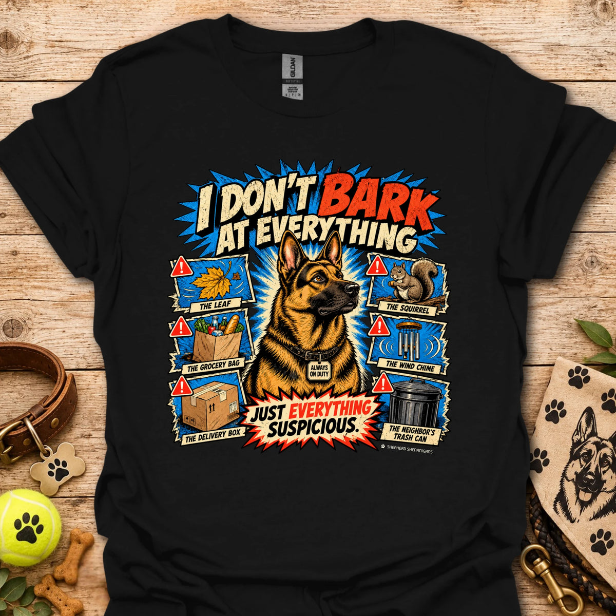 Black T-shirt with colorful comic dog graphic and bold slogan print