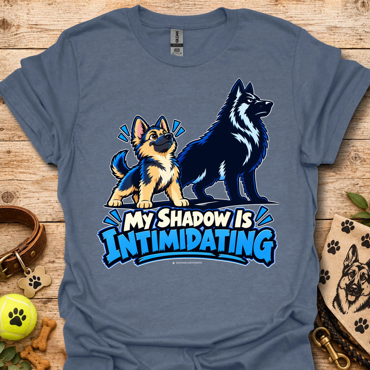 Blue t-shirt with wolf dog graphic and blue “My Shadow Is Intimidating” text