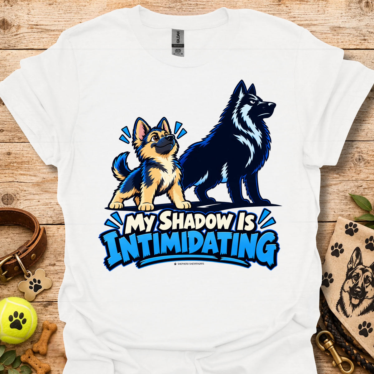 White t-shirt with wolf dog graphic and blue “My Shadow Is Intimidating” text