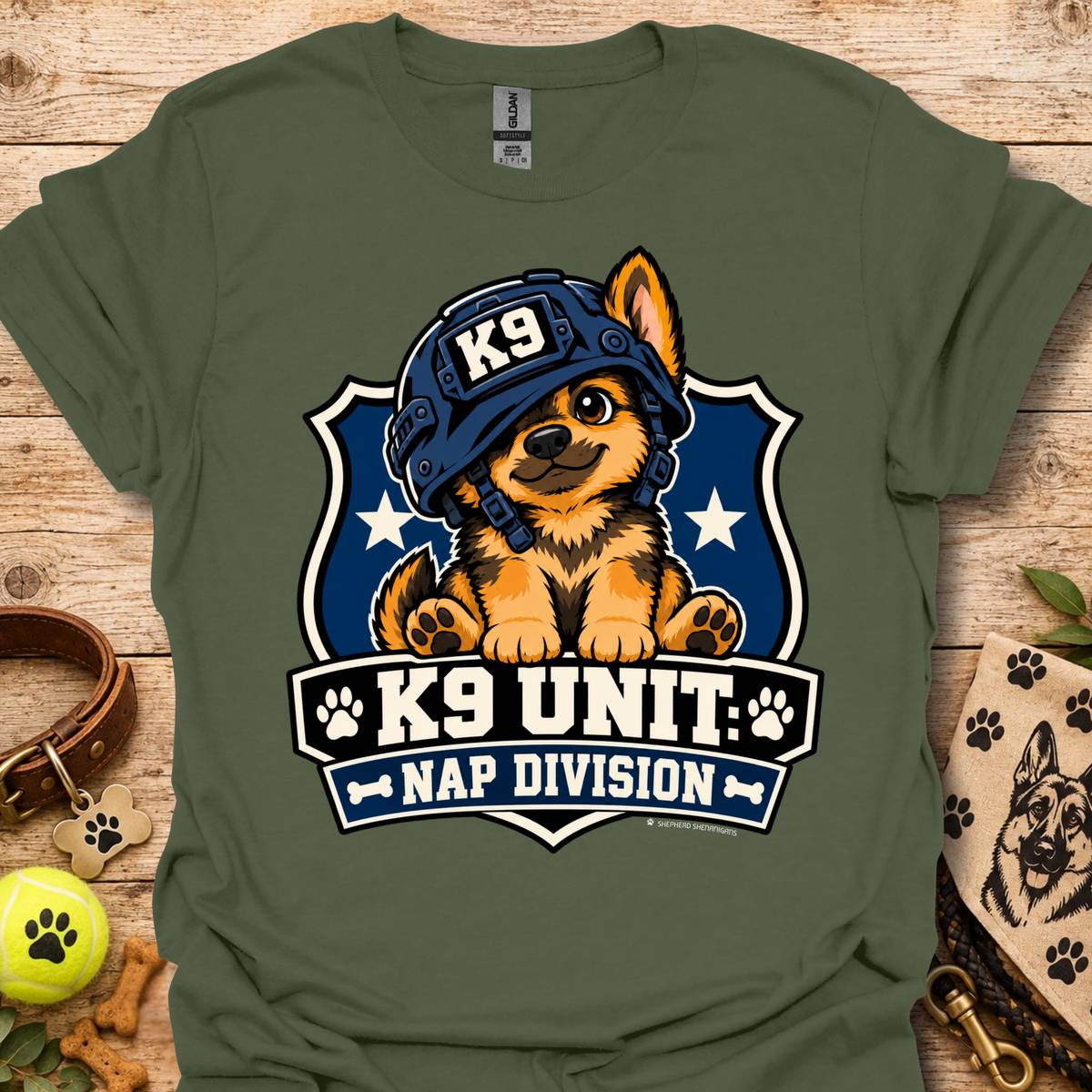 Olive green T-shirt with K9 Unite Nap Division dog graphic on the front.