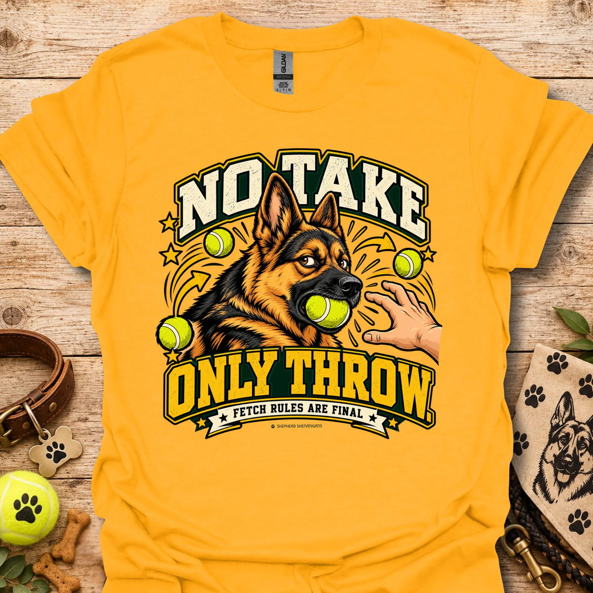 Gold T-shirt with “NO TAKE ONLY THROW” dog-and-tennis-ball graphic