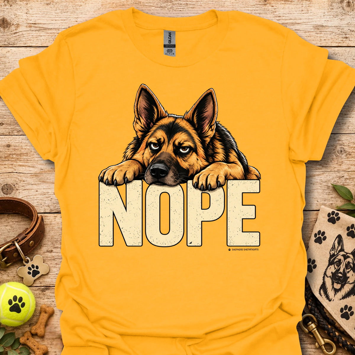 Gold dog graphic t-shirt with “NOPE” text and German shepherd face front print