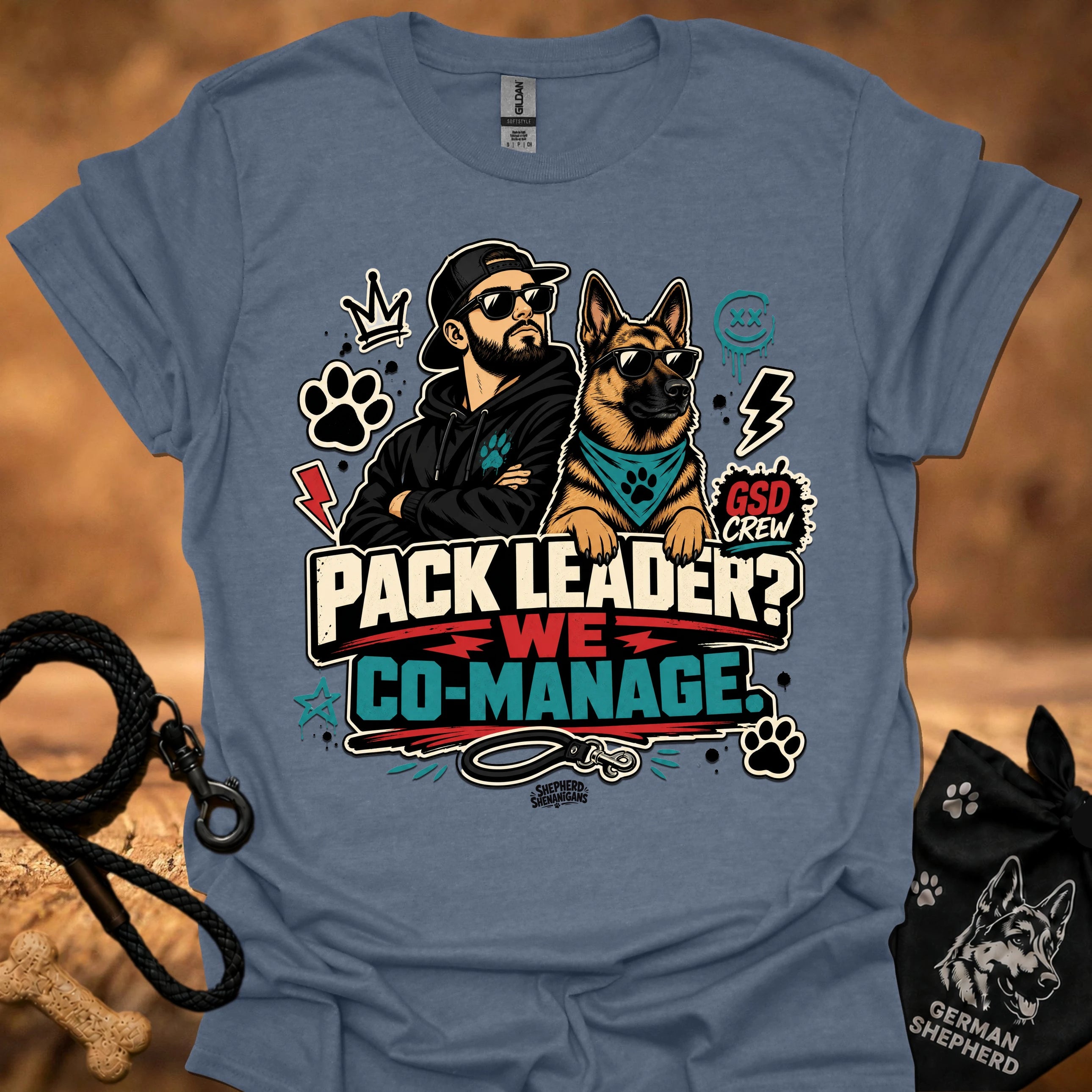 Heather indigo crew-neck short-sleeve T-shirt with illustrated dog-and-man graphic and “Co-Manage” text