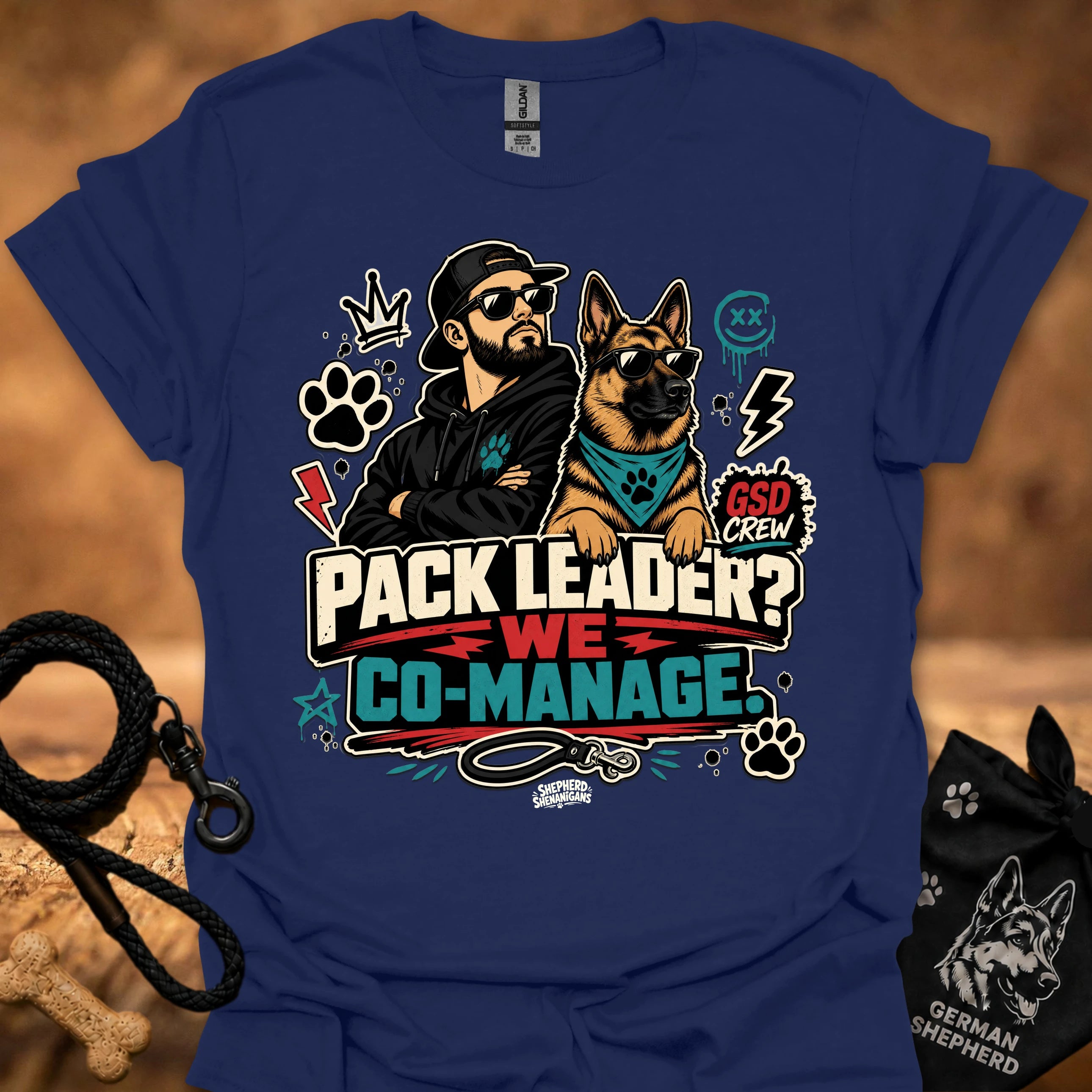 Royal blue crew-neck short-sleeve T-shirt with illustrated dog-and-man graphic and “Co-Manage” text