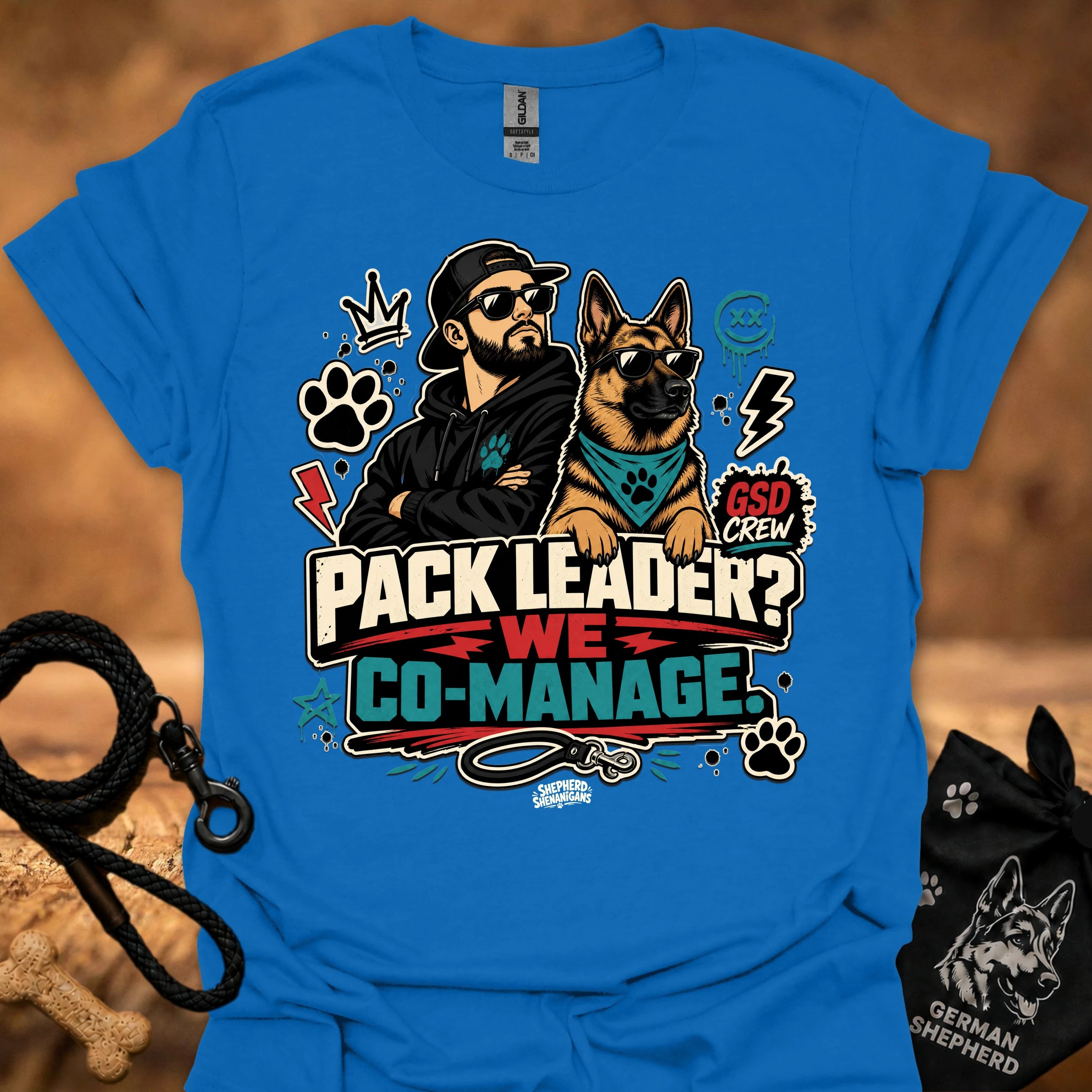 Navy blue crew-neck short-sleeve T-shirt with illustrated dog-and-man graphic and “Co-Manage” text