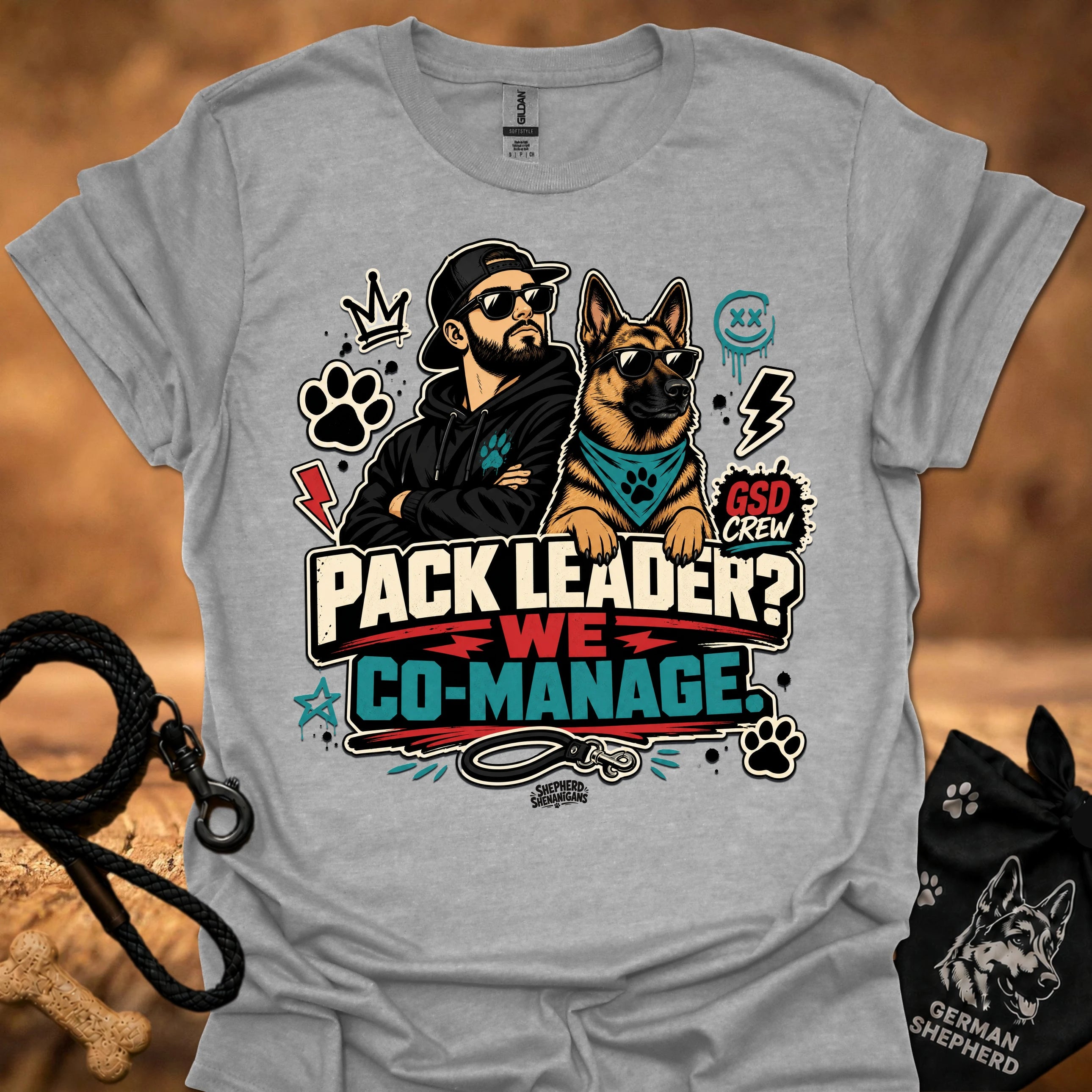 Light gray crew-neck short-sleeve T-shirt with illustrated dog-and-man graphic and “Co-Manage” text
