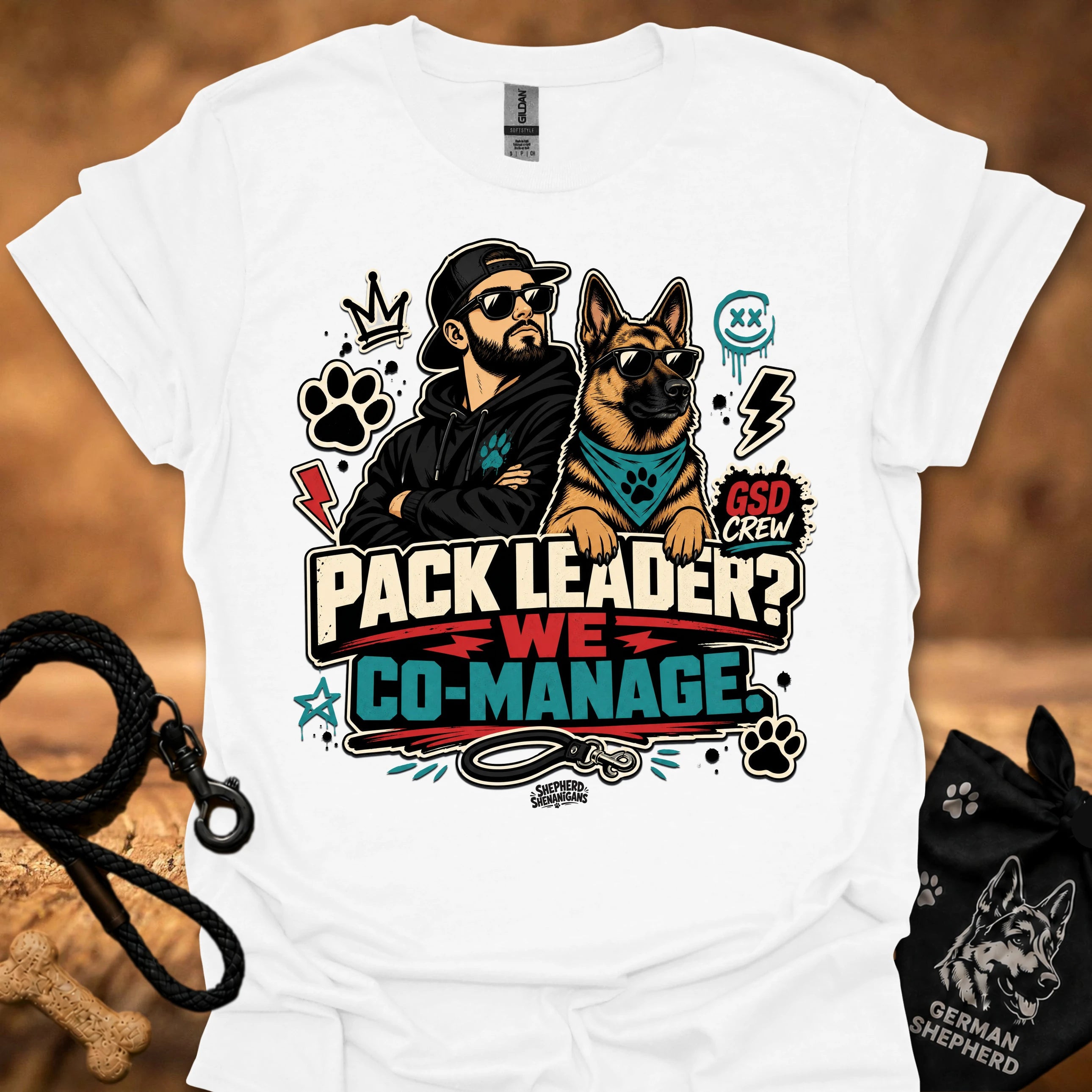 White crew-neck short-sleeve T-shirt with illustrated dog-and-man graphic and “Co-Manage” text