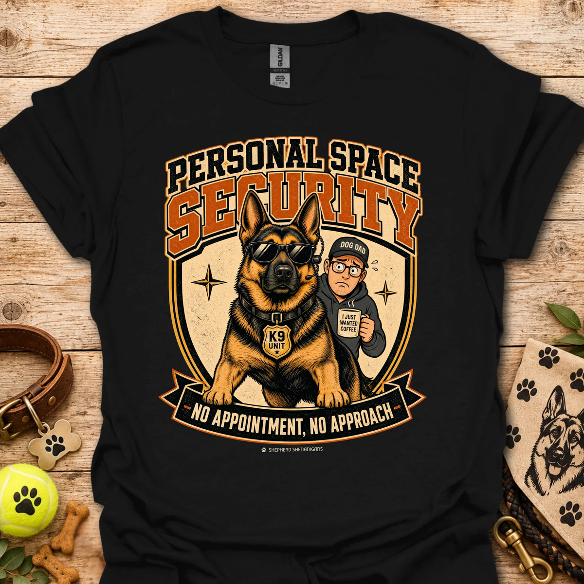 Black T-shirt with a security dog and handler graphic and bold lettering.