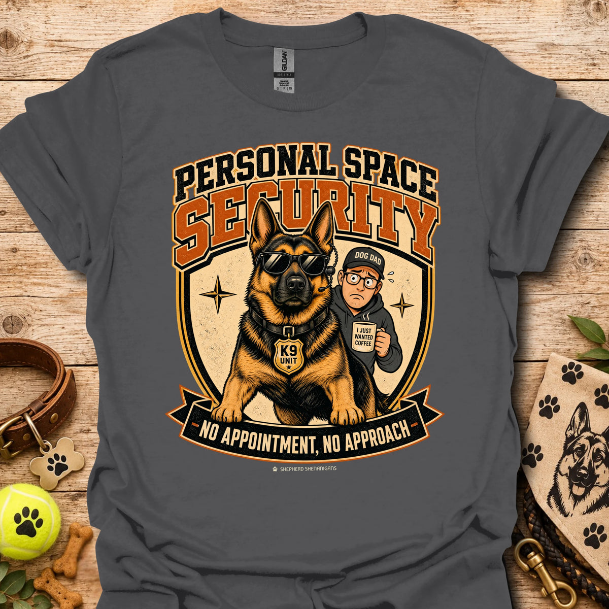 Charcoal T-shirt with a security dog and handler graphic and bold lettering.