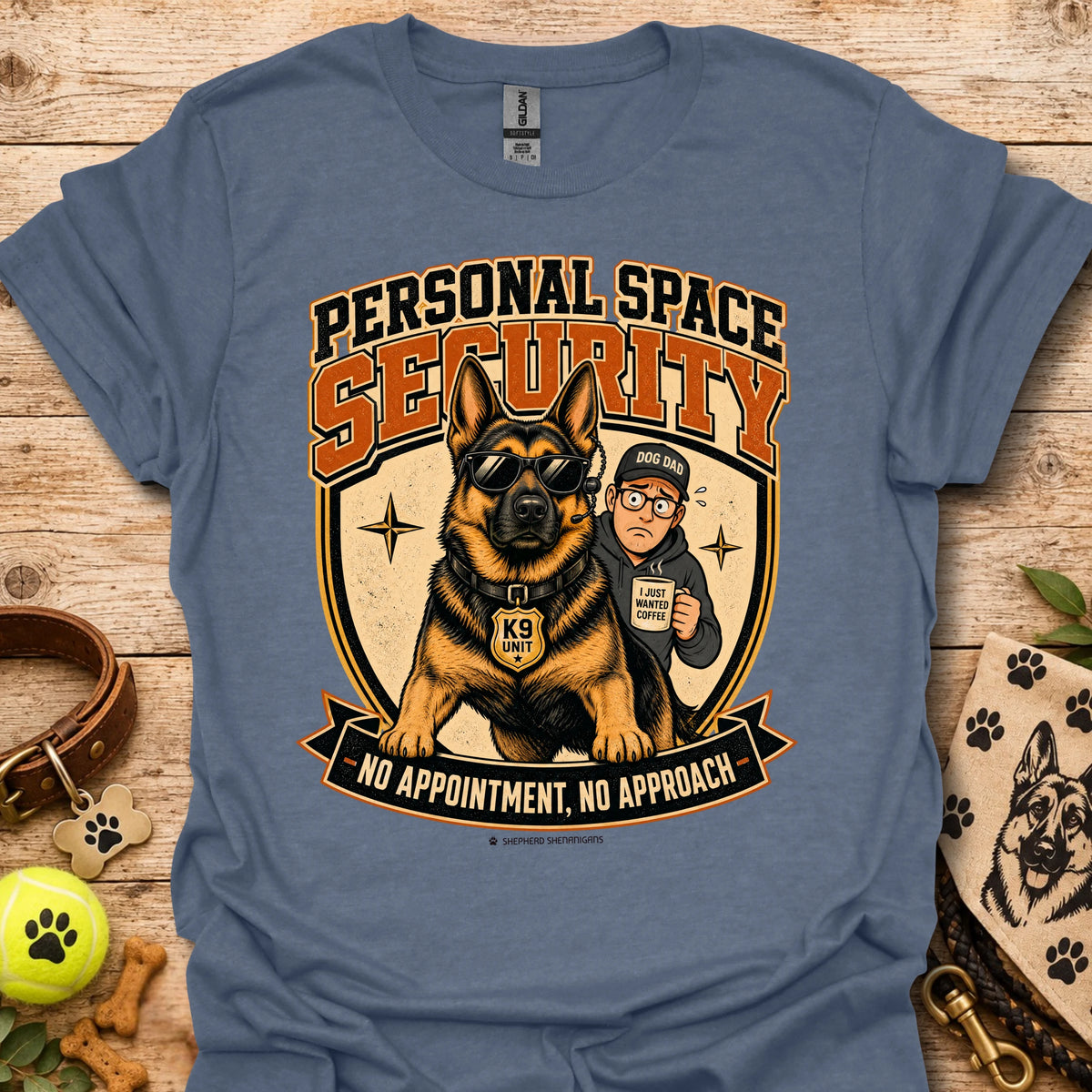 Heather indigo T-shirt with a security dog and handler graphic and bold lettering.