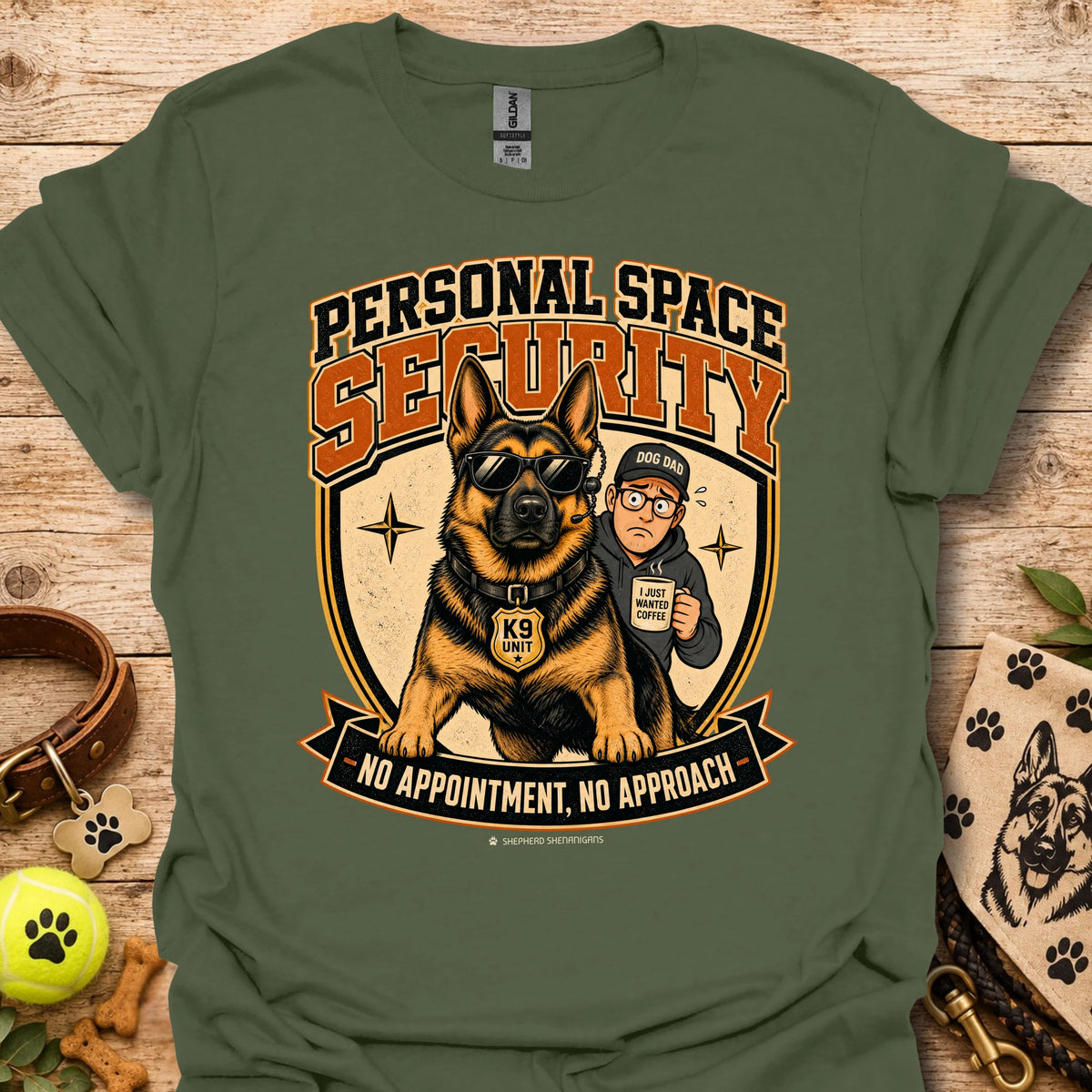 Military green T-shirt with a security dog and handler graphic and bold lettering.