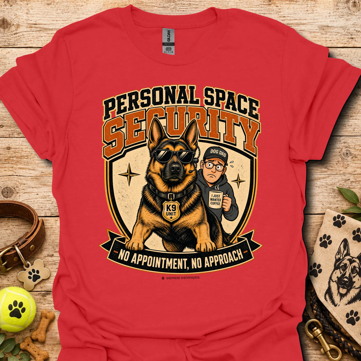 Red T-shirt with a security dog and handler graphic and bold lettering.
