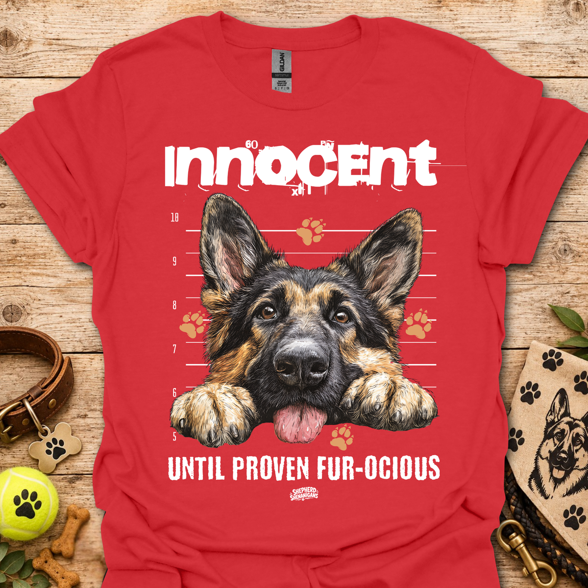 Red T-shirt with German shepherd graphic and "Until Proven Fur-ocious" slogan