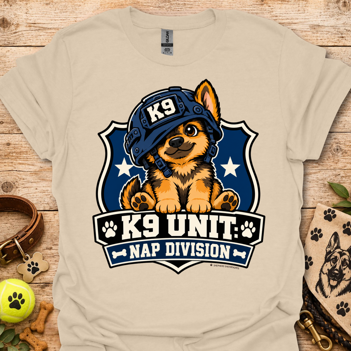Sand beige T-shirt with K9 Unite Nap Division dog graphic on the front.