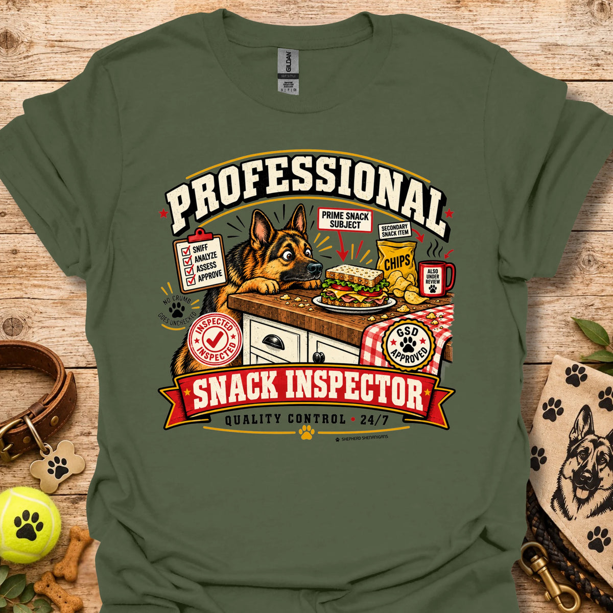 Green crew-neck T-shirt with large “Professional Snack Inspector” graphic and dog