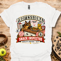White crew-neck T-shirt with large “Professional Snack Inspector” graphic and dog