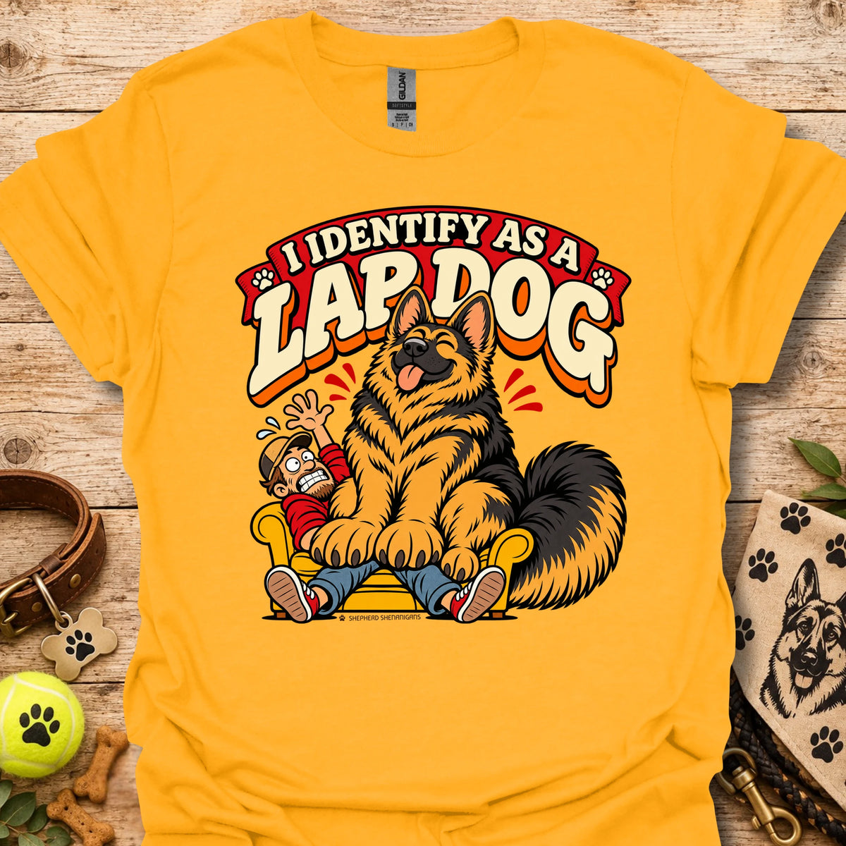 Gold T-shirt with a cartoon lapdog graphic and "I Identify as a Lapdog" text