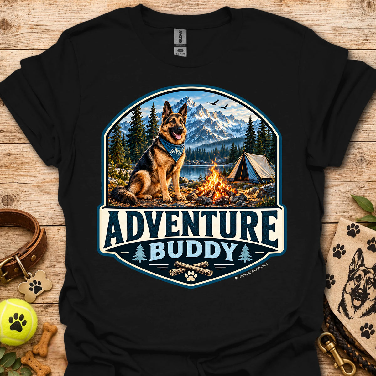 Black t-shirt with badge-style camping dog graphic and adventure lettering