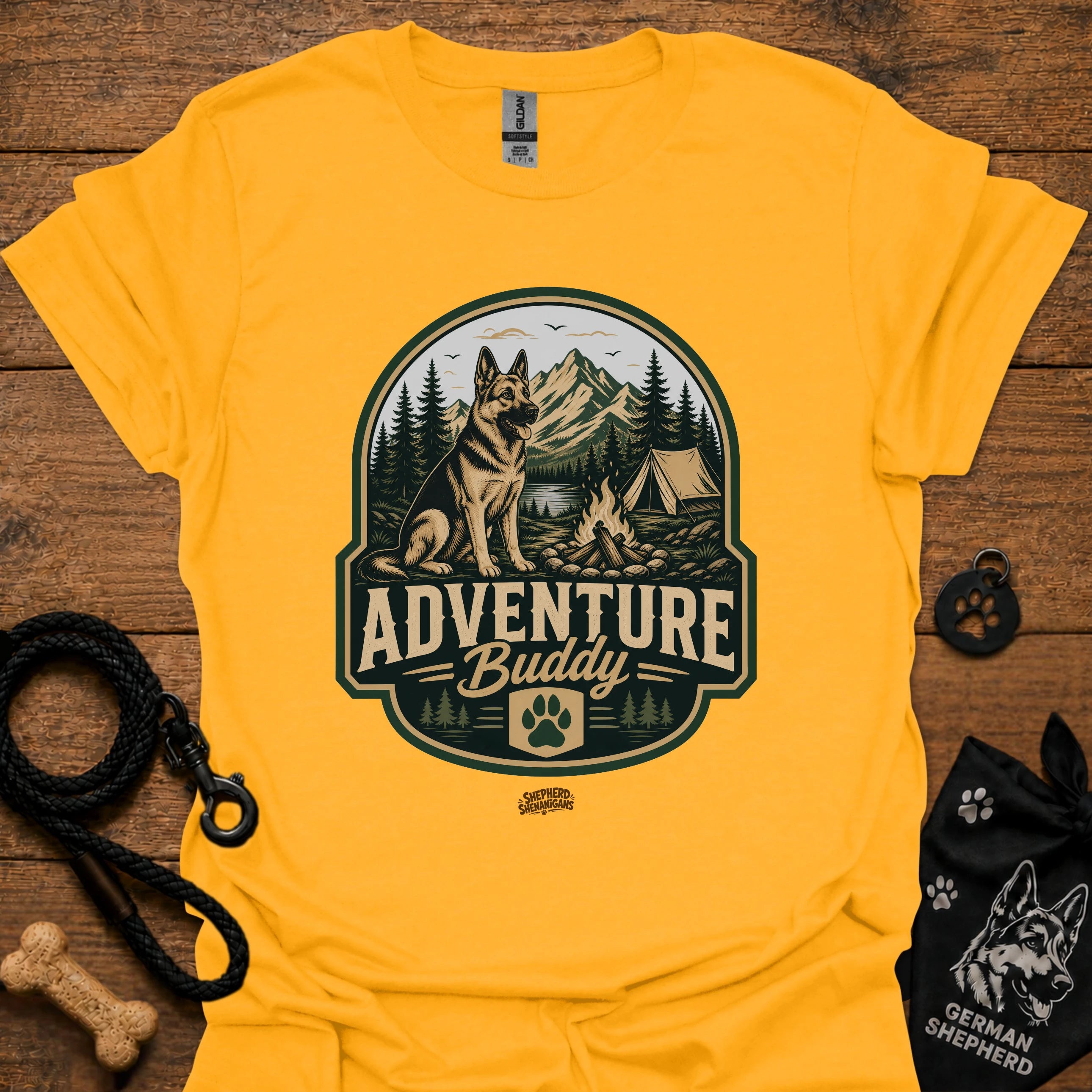 Gold dog adventure graphic T-shirt with round “Adventure Buddy” logo