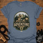 Slate blue dog adventure graphic T-shirt with round “Adventure Buddy” logo