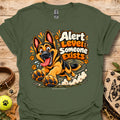 Military green crewneck T-shirt with colorful alert dog graphic and paw prints