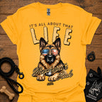 Gold T-shirt with German Shepherd graphic wearing USA sunglasses and LIFE text