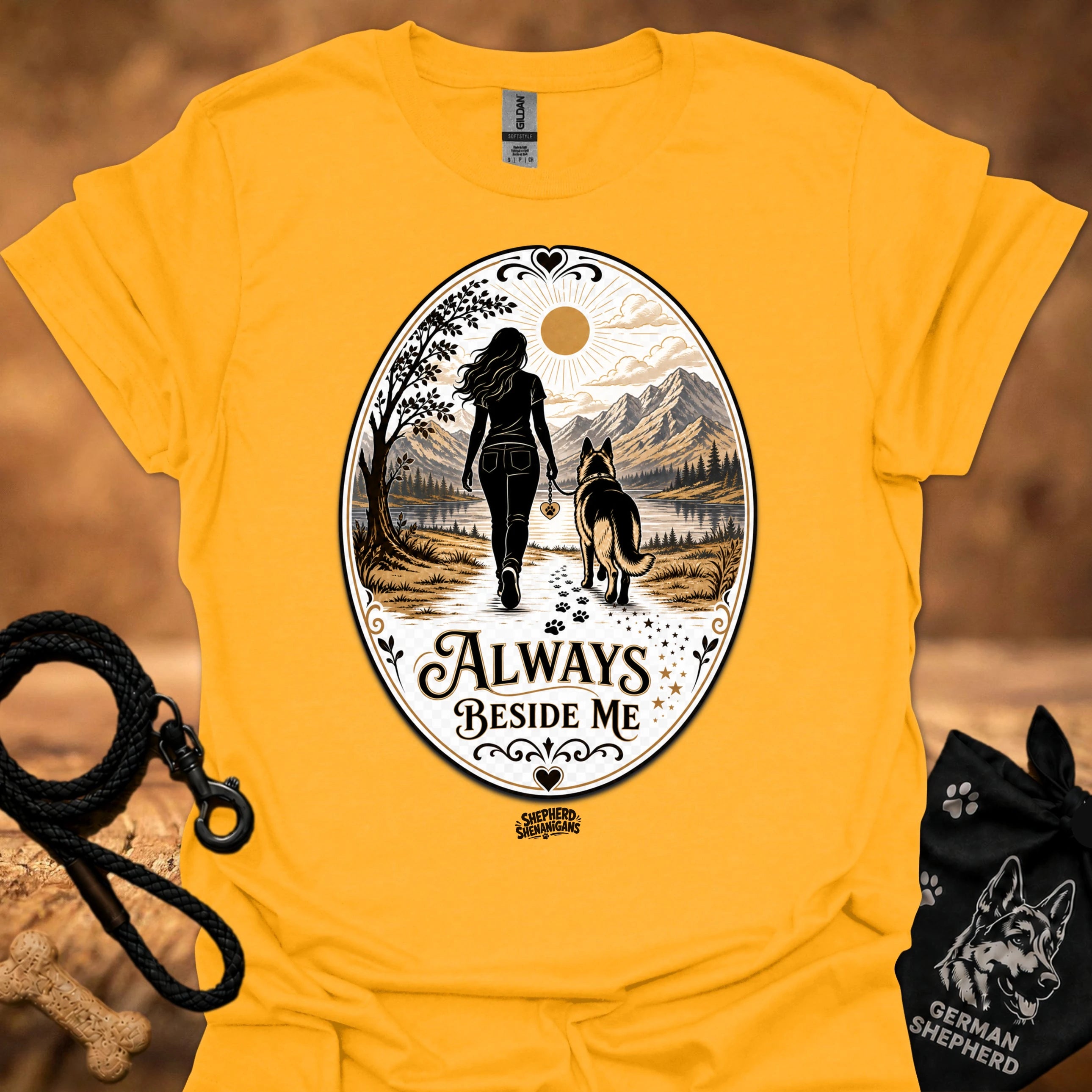 Gold crewneck T-shirt with large circular vintage graphic of a woman and dog