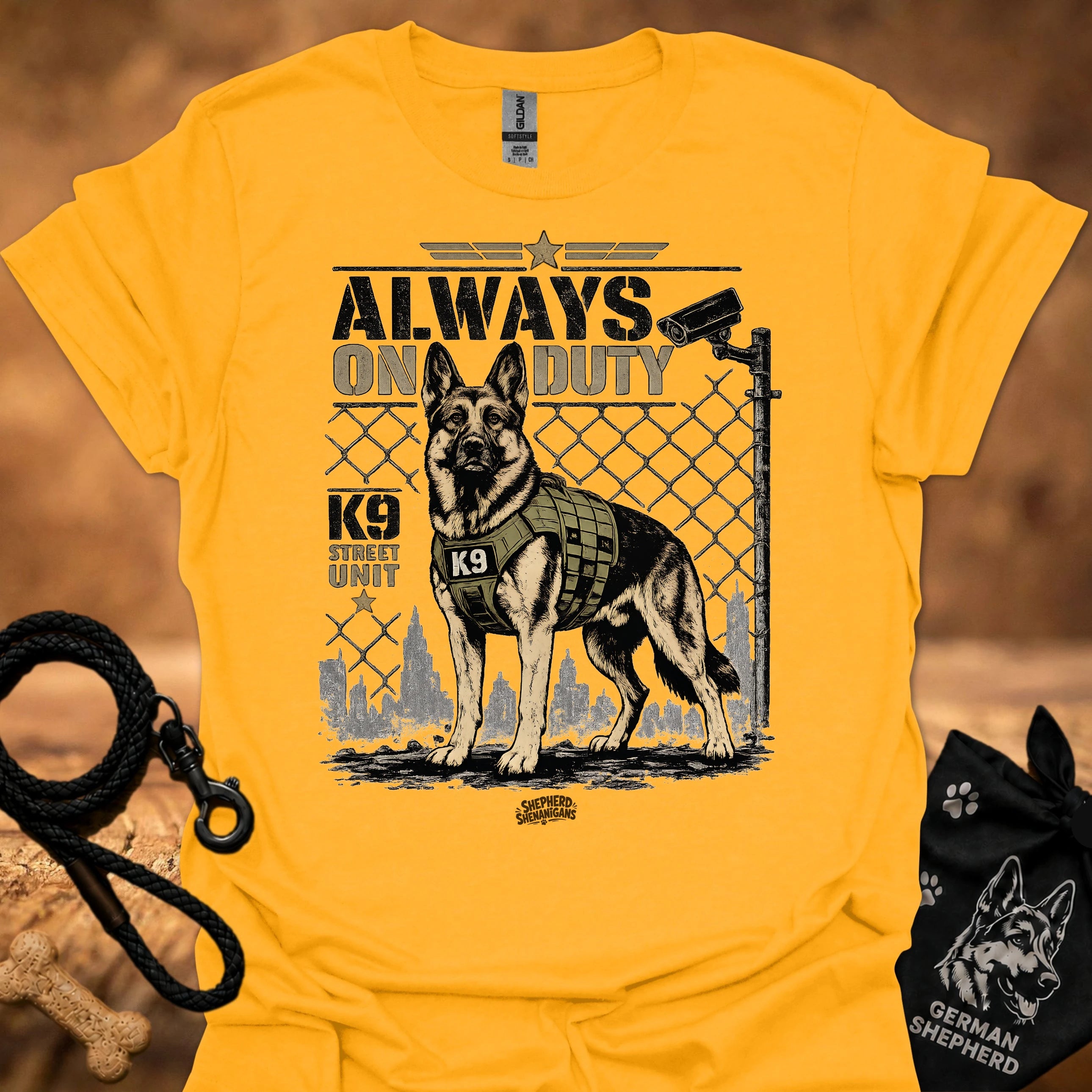 Gold graphic t-shirt with German shepherd K9 fence print and short sleeves