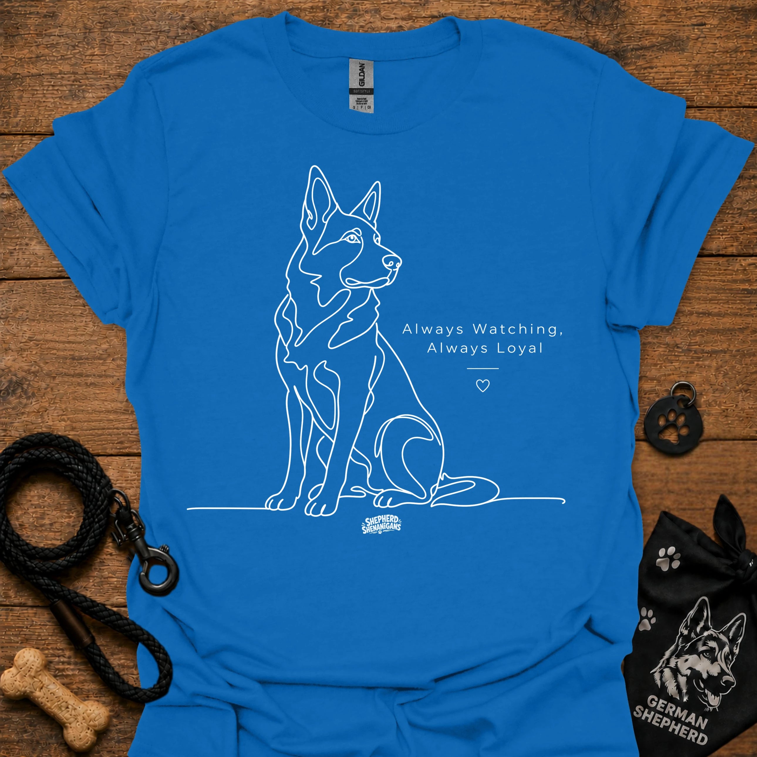 Royal blue dog graphic t-shirt with line art and text: Always Watching, Always Loyal
