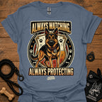 Light blue dog graphic slogan T-shirt: Always Watching, Always Protecting