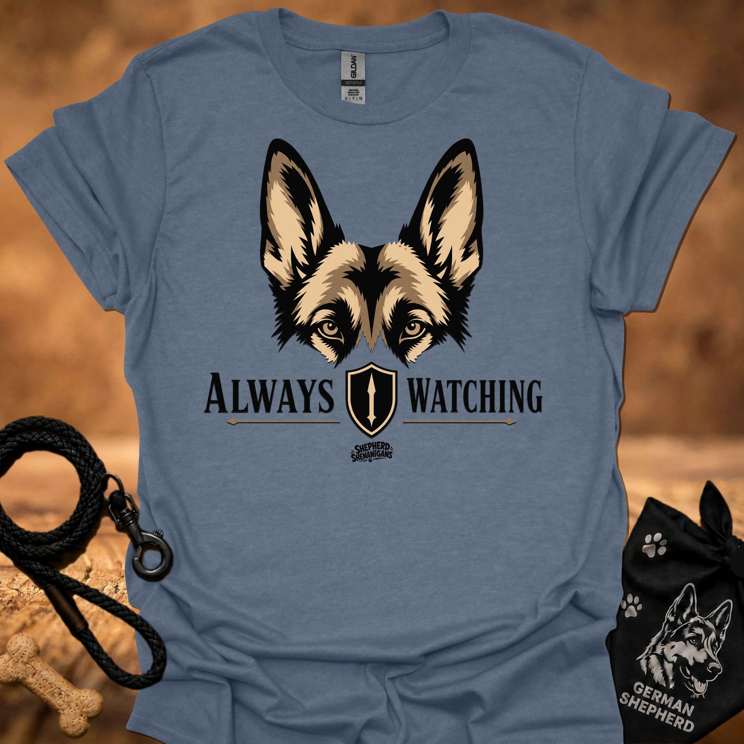 Heather indigo graphic dog face T-shirt with “Always Watching” text and shield icon