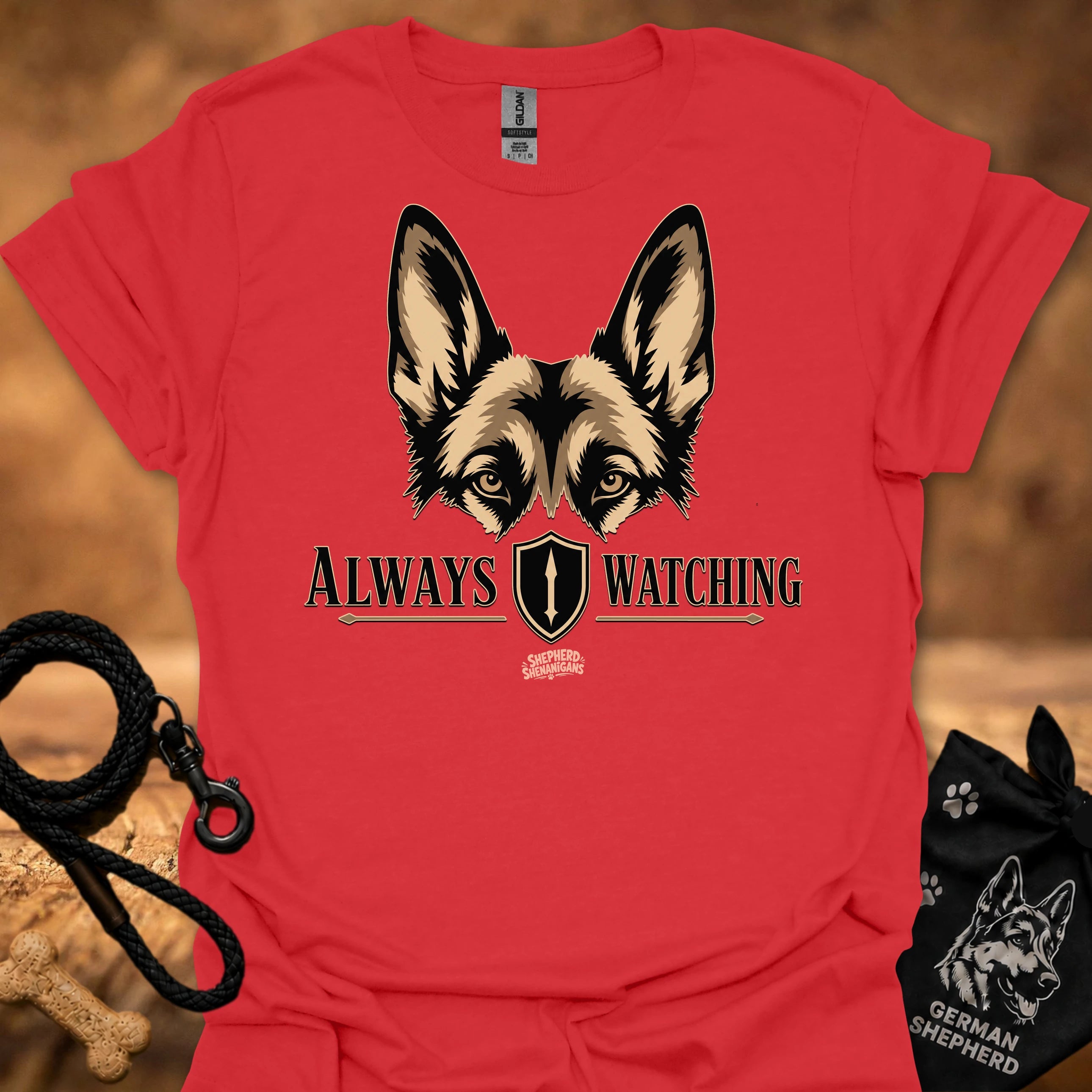 Red graphic dog face T-shirt with “Always Watching” text and shield icon