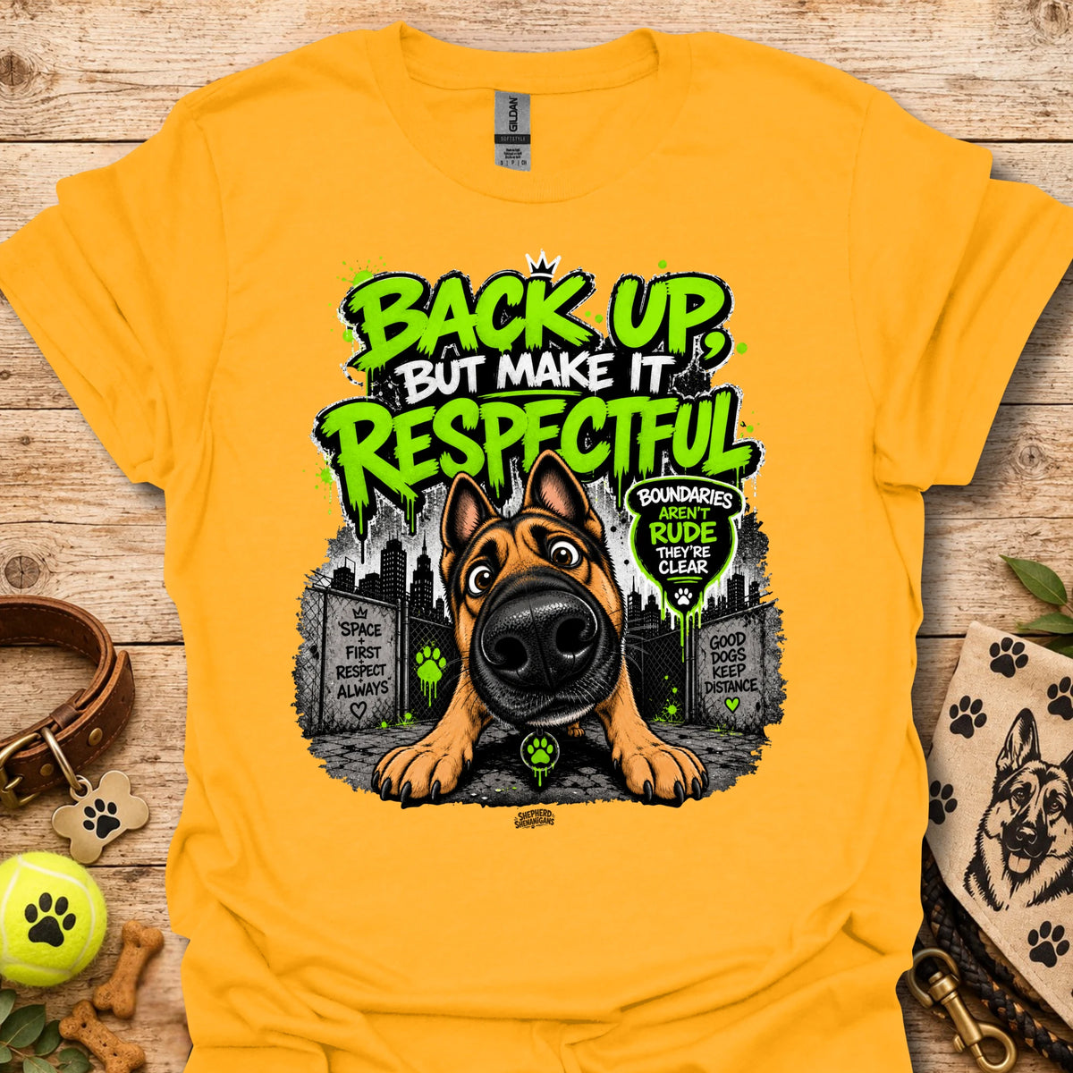 Crew-neck gold t-shirt with dog portrait graphic and “Back up but make it respectful” text