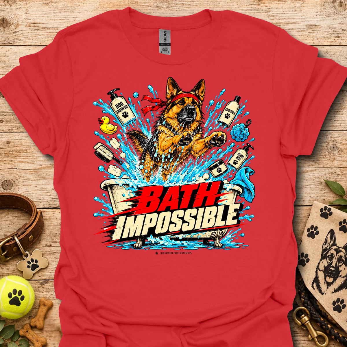 Graphic dog bath T-shirt in red with colorful splash and dog-themed text graphic