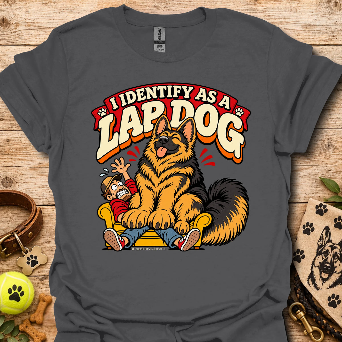 Charcoal T-shirt with a cartoon dog sitting on a person and "I Identify as a Lapdog" text