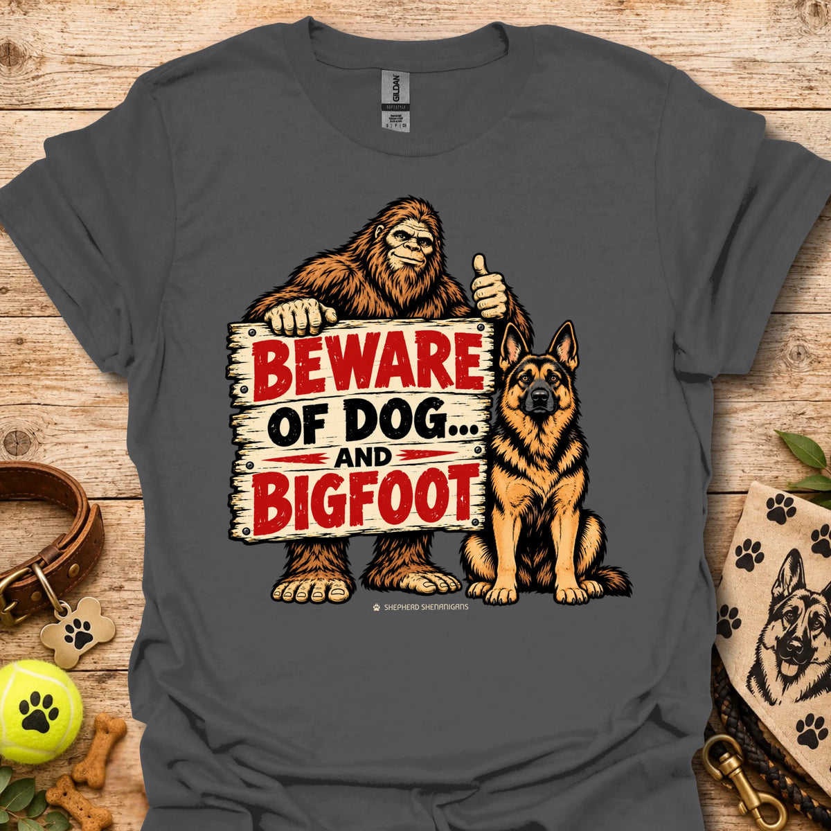 Dark gray T-shirt with bigfoot and dog warning graphic: BEWARE OF DOG AND BIGFOOT