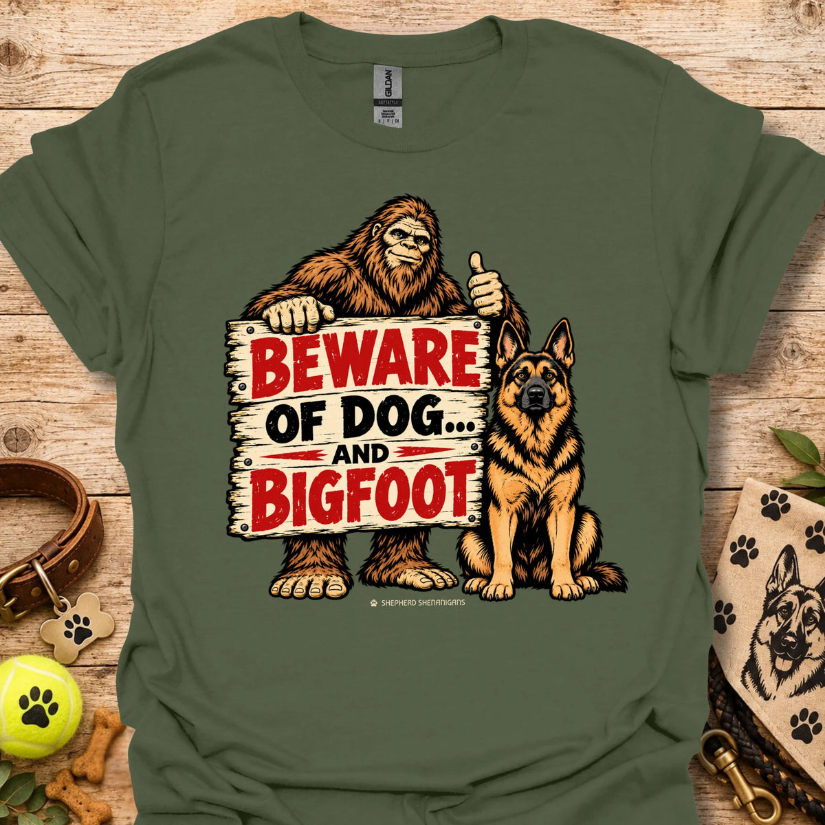 Military green T-shirt with bigfoot and dog warning graphic: BEWARE OF DOG AND BIGFOOT