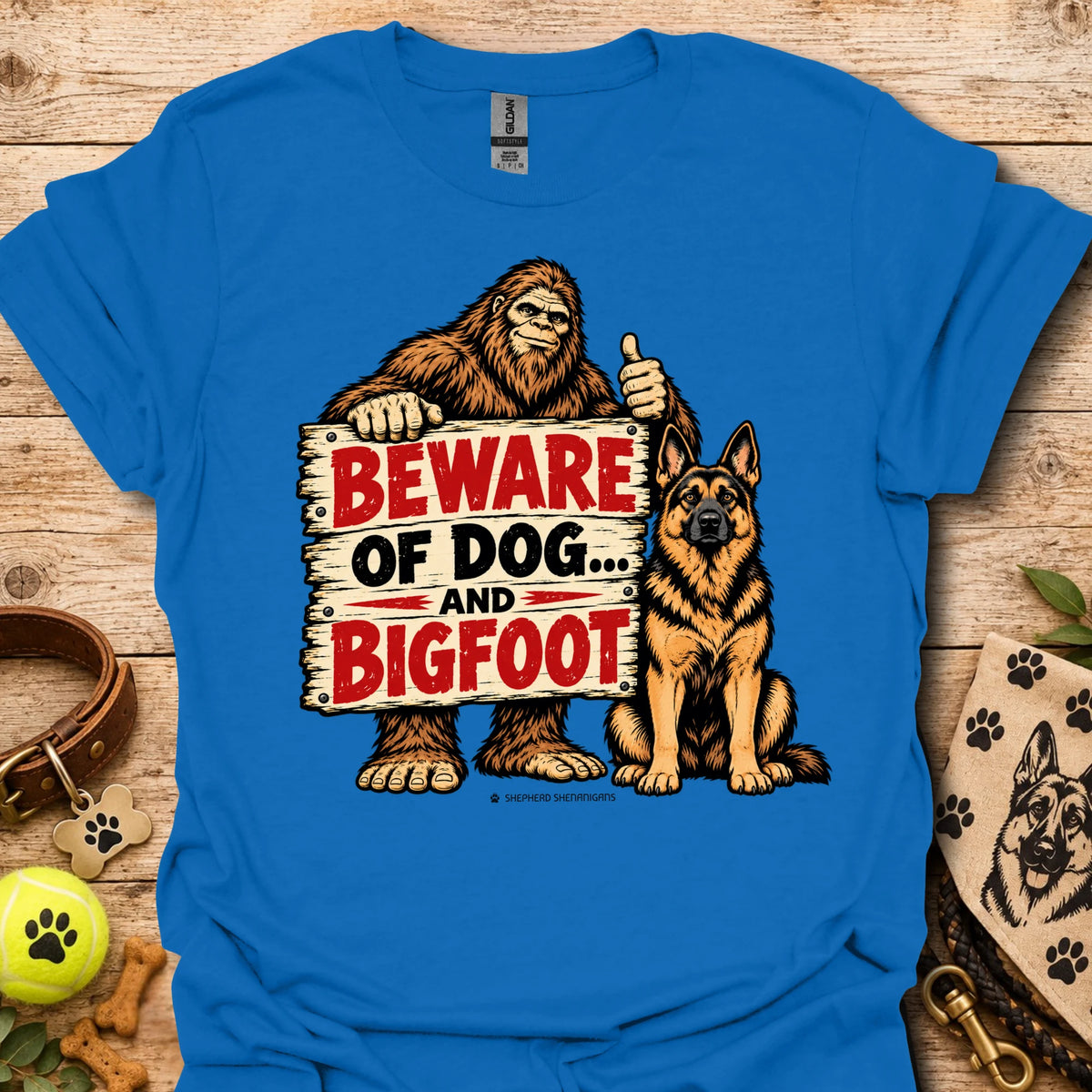 Royal blue T-shirt with bigfoot and dog warning graphic: BEWARE OF DOG AND BIGFOOT