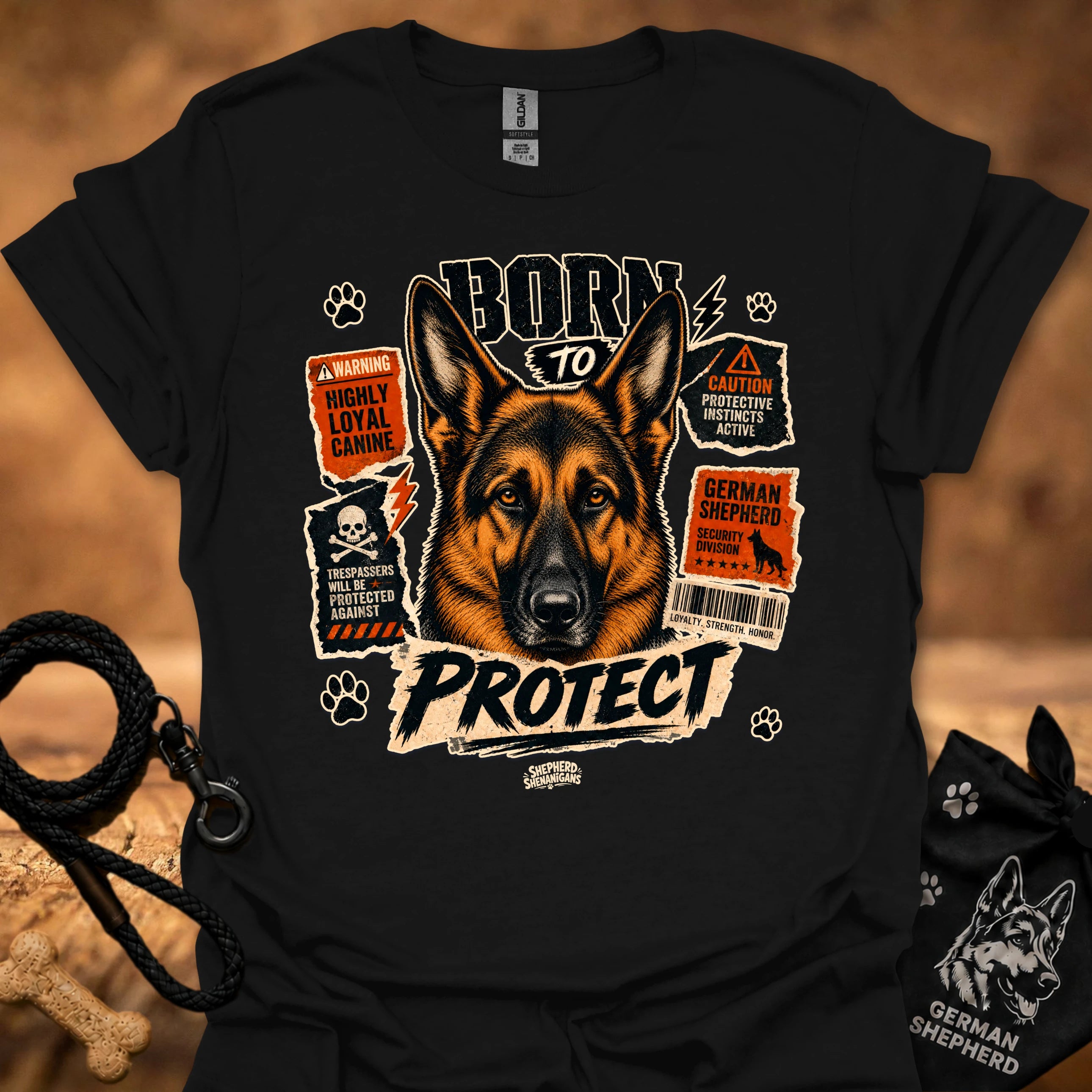 Black graphic dog T-shirt with 'Born to Protect' text and paw print icons
