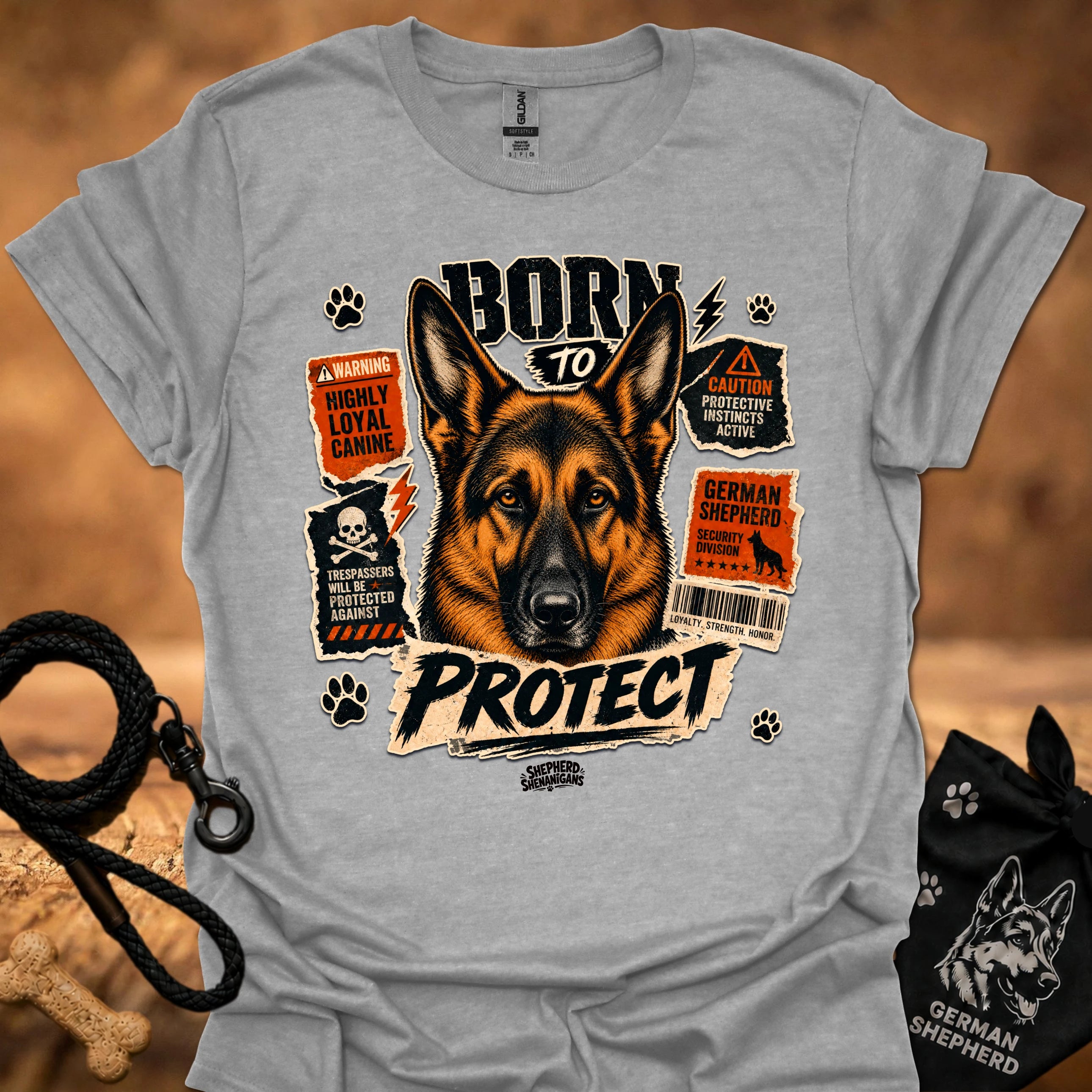 Sport gray graphic dog T-shirt with 'Born to Protect' text and paw print icons