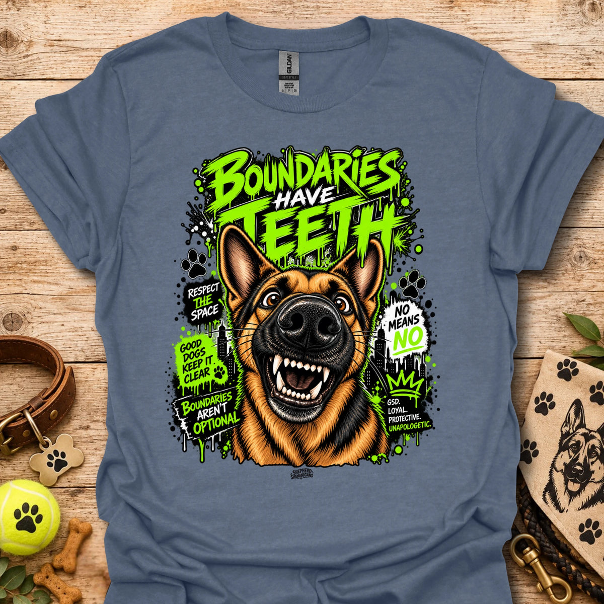 Heather indigo T-shirt with colorful dog head graphic and 'Boundaries Have Teeth' text
